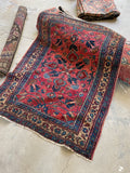 Small antique Persian rug