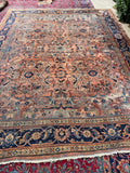 Large antique Persian rug