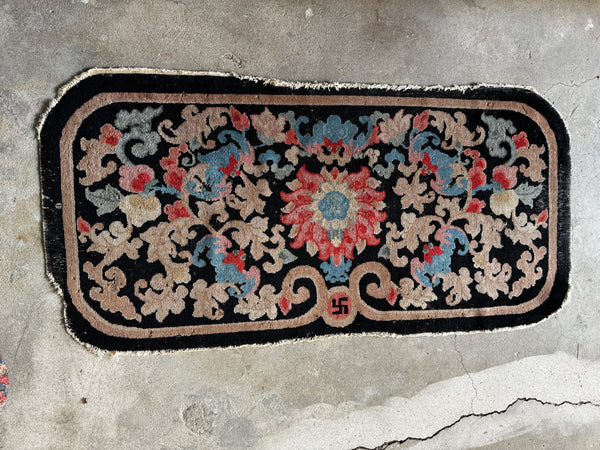 Antique Chinese rug with central swastika and floral medallion, handwoven wool circa 1920s

