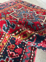 Small vintage Persian rug with rectilinear motifs
