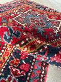 Small vintage Persian rug with rectilinear motifs