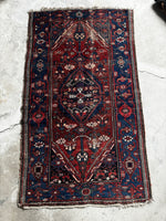 1920s handwoven Persian rug with worn low pile and natural vegetable-dyed wool, 3'3 x 6'4

