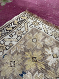 2x2 antique rug