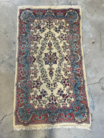 small vintage Persian rug