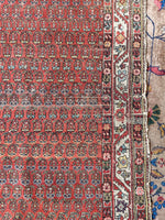 worn Persian rug