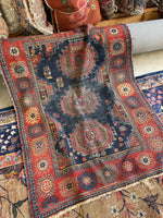 Small antique rug