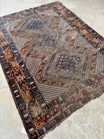 Handmade vintage Persian rug