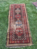 worn persian runner