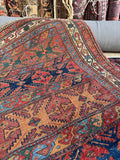 Early 1900s Persian Bidjar wool rug with a dense, heavy handmade construction.