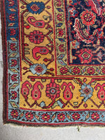 Persian Bidjar rug showing blue abrash variations.