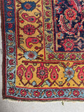 Persian Bidjar rug showing blue abrash variations.