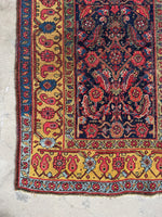 Handwoven Bidjar rug with vegetable dyed wool and abrash details.