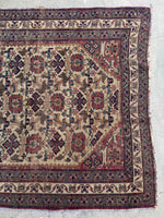 Antique Afshar rug with multiple layered borders and rosette motifs.