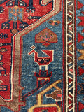 Small antique Persian rug. Vintage Heriz wool carpet with scattered wear, dense weave, and exceptional durability for everyday living.