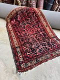 decorative and vibrant antique Persian Malayer accent rug showing continuous floral chain border