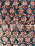 condition detail of antique Persian rug showing spot on side border and scattered wear consistent with age and decades of use