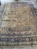 Antique Kerman rug 9’9 x 12’9 with curvilinear floral motifs.