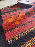 Handwoven Anatolian flatweave with subtle color variation, angular motifs, and a beautifully aged surface.