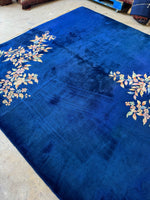 Heavy-duty 1930s Art Deco rug with glowing colors and open field design.