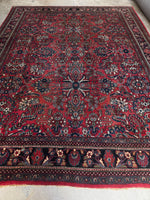 Large Bibikabad rug with moody color palette.
