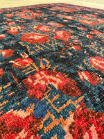 Close-up of rose motifs on a 1920s Persian Bidjar rug.