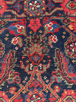Persian Bidjar rug with striking midnight blue ground.