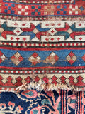 Antique rug in natural sage green wool, c. 1900, with multiple border bands.