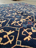 Close-up of vibrant colors on Caucasian rug.