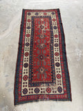 Full view of handwoven Caucasian mountain runner with geometric tribal design.