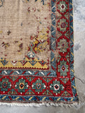 Antique tribal Caucasian runner, early 1900s handmade wool rug with an open ivory field, bold geometric borders, and beautifully aged patina.