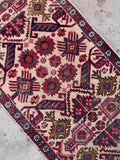 Vintage Caucasian scatter rug with hand-knotted tribal art design in bone ivory and blue.