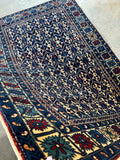 Ivory motif detail on Caucasian rug.