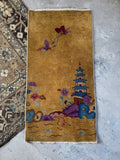 1920s Chinese rug featuring a lakeside bridge, florals, and butterflies.