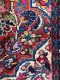 Hand knotted Persian Dargazin rug with compact healthy wool pile and floral artwork.