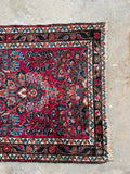 One end view of antique Persian Dargazin runner low pile with soft feel underfoot and rich dyes.