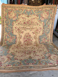 Antique French Aubusson tapestry rug with pastel floral motifs and a dreamy baby blue ground.