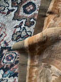 Antique French textile panel with close-up of weave.