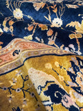 Closeup view of antique rug highlighting depth, sheen, and design.