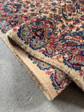 Close up view of extra long runner 21 ft 5 in by 35 in with balanced floral composition.