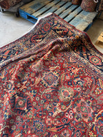 Colorful Persian rug with vibrant natural dyes.