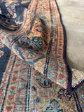 Antique Mahal rug detail highlighting linear village weaving style.