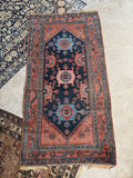 Full view of antique Persian Malayer rug circa 1910 with tribal geometric design.
