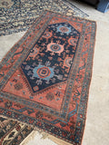 Antique Persian Malayer rug with handwoven warm and cool tones.