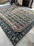 Vintage Persian Malayer rug with sun-kissed blush field and dark blue motifs.