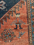 Kurdish weaver human figure motif woven into antique Malayer rug.