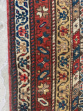 Vintage Persian vegetable dyed wool rug.