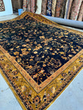 Antique Indian Laristan rug with midnight blue field and marigold floral design.