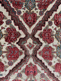 Early 20th century Persian Bakhtiari area rug featuring natural wool sheen and heavy body.