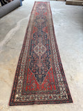 Antique Bibikabad runner showing classic Herati design woven with vegetable dyed wool.