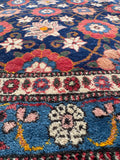 Traditional Mina Khani carpet with multi-band decorative floral border trim.